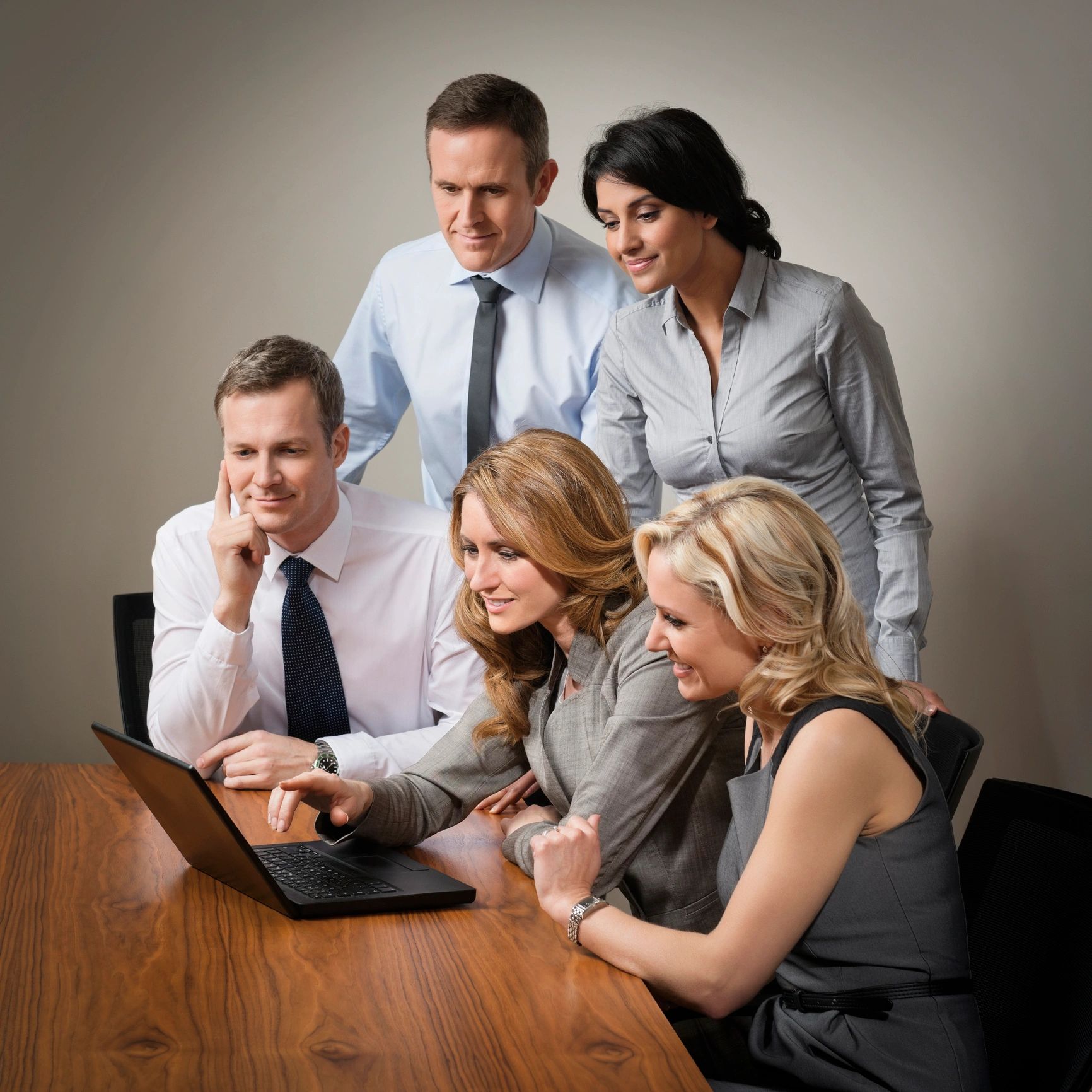 Technology professionals collaborating in a meeting